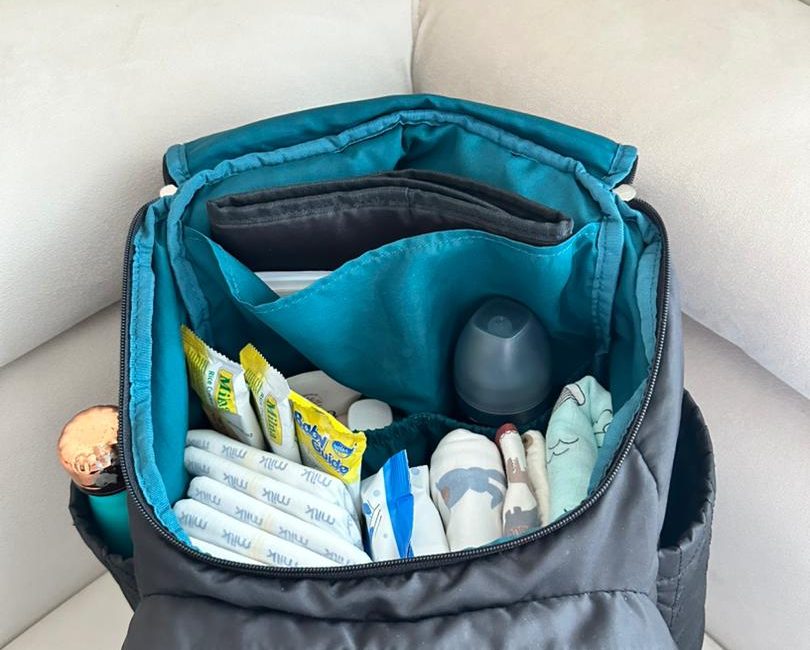 A diaper bag with baby care essentials
