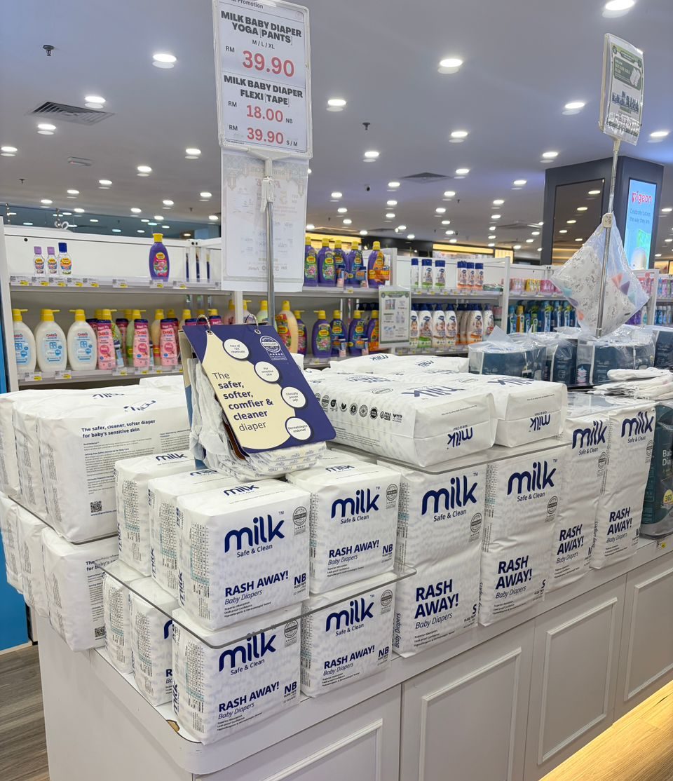 Island display of MILK diapers on shelves