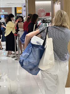 white lady holding diaper