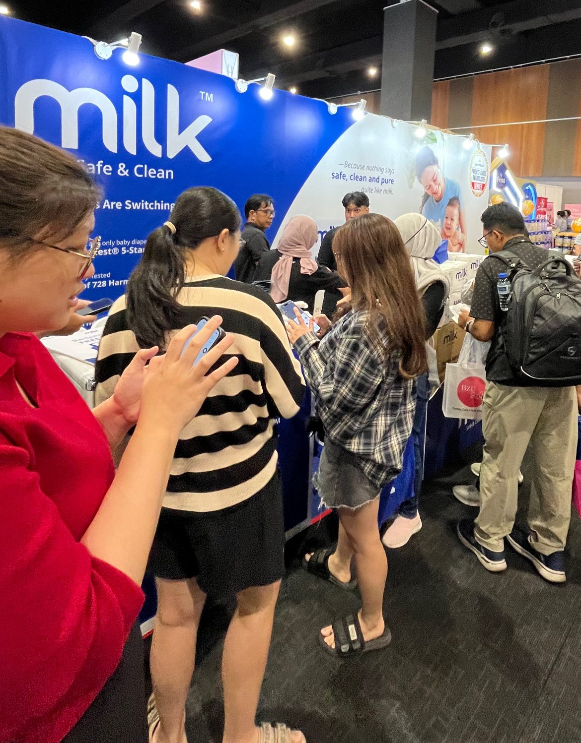 baby expo crowd in front of MILK diapers